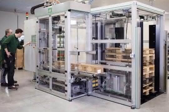 Verpackungsmaschine mit einem Pick-and-Place-Palettierroboter