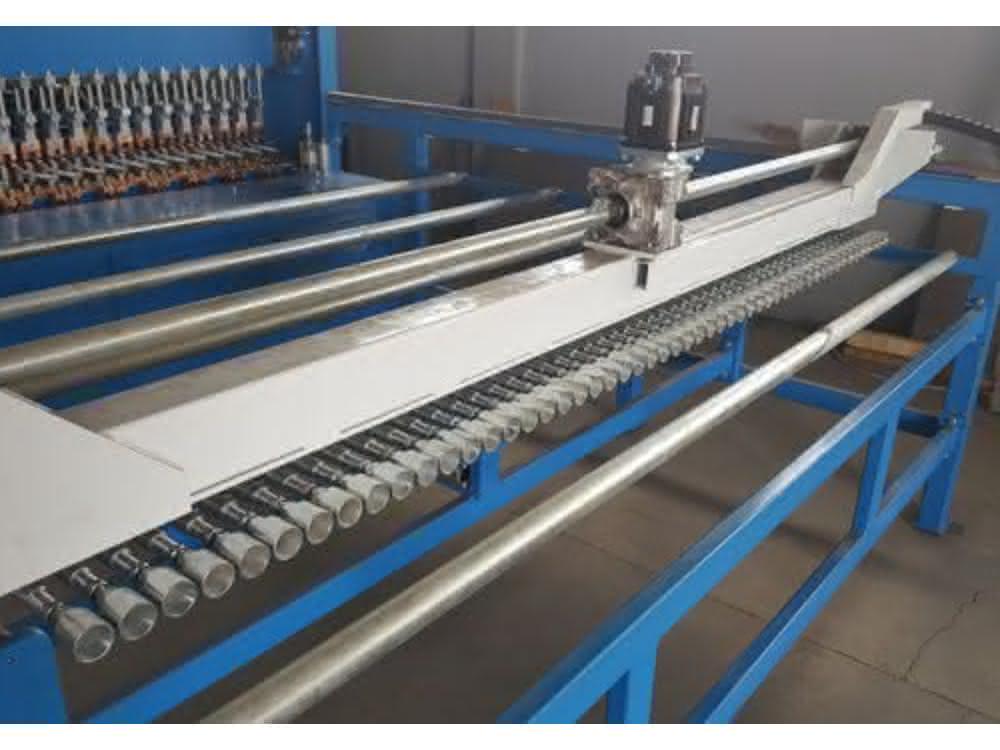 Machine for the production of structural steel mesh