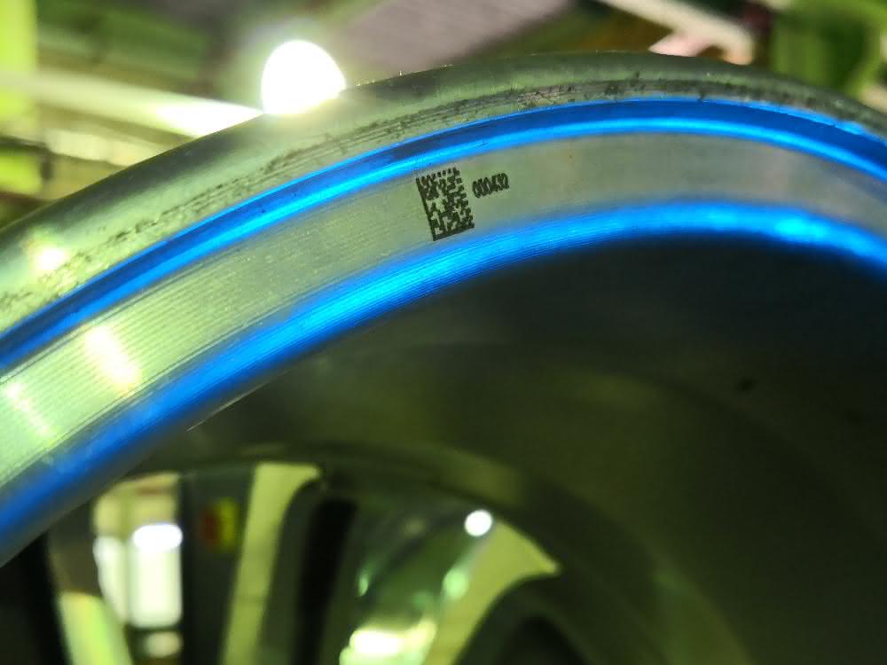 QR code on rim at Femco The app is used to photograph QR codes on the rims. The app can then be used to display information about the rim's manufacturing process: from status and processing steps to machine information and tool data.