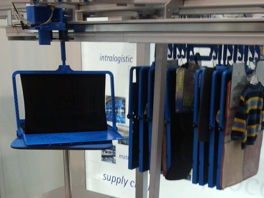 Flexible overhead conveyor systems for production, warehousing and e-commerce Flexible overhead conveyor systems for production, warehousing and e-commerce