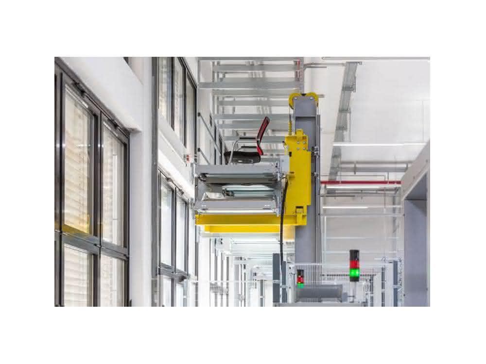Vertical conveyor to upper conveyor level Vertical conveyor to upper conveyor level