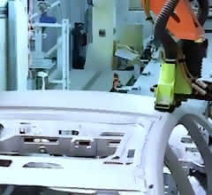 The roof of a car body is machined Roof
