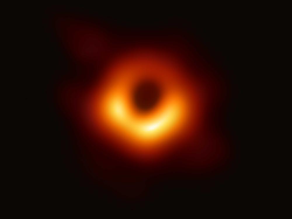 Das erste Bild des Schwarzen Lochs in der benachbarten Galaxie M87, aufgenommen vom Event Horizon Telescope-Projekt. Das erste Bild des Schwarzen Lochs in der benachbarten Galaxie M87, aufgenommen vom Event Horizon Telescope-Projekt.