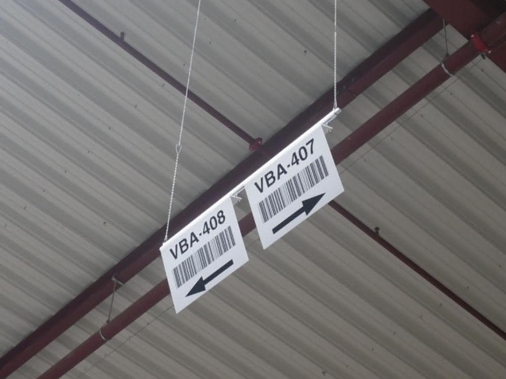 Signs at a height of five and a half meters are bent at a 90-degree angle