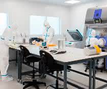 Employees in a clean room laboratory