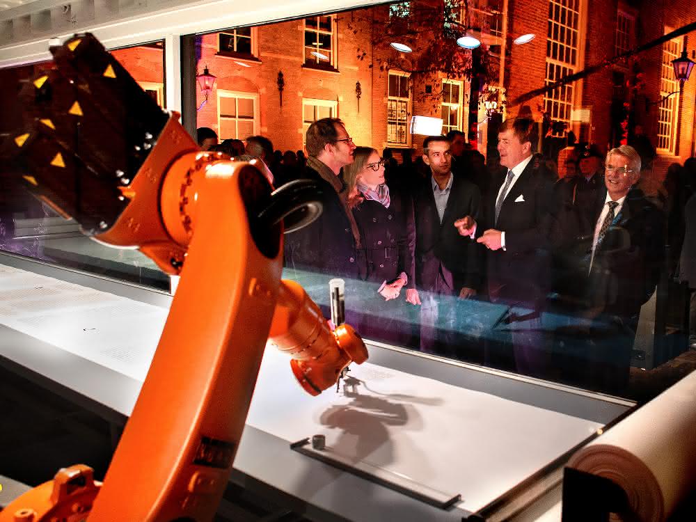 Artists have robots copy the Bible