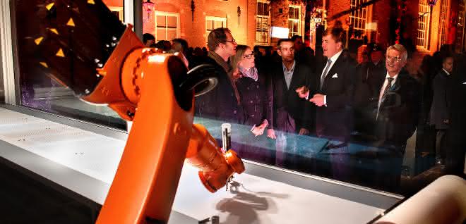 Artists have robots copy the Bible