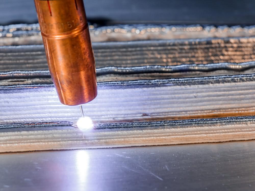 Arc and wire-based additive manufacturing