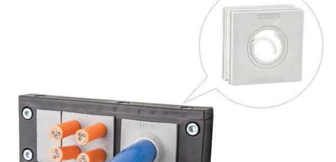 Cable grommet with stepped sealing rings