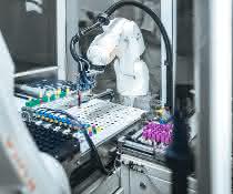 Kuka robot sorts blood samples Kuka robot sorts blood samples