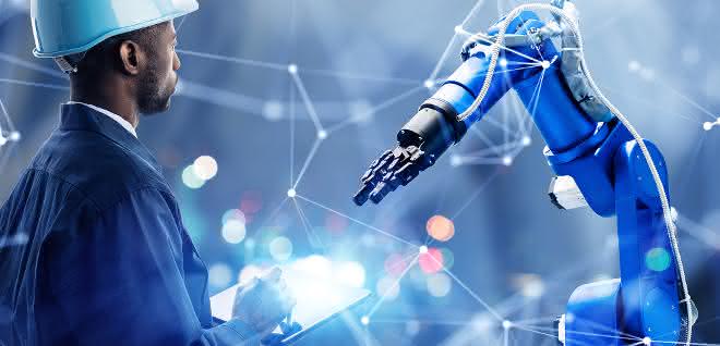 Virtual commissioning: Simulate production systems Robot arm and human with safety helmet