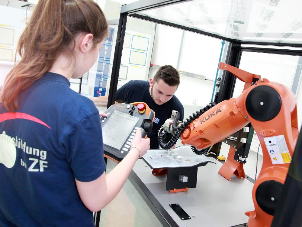 Robot arm and programming persons