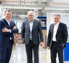 Manfred Lehner (center)