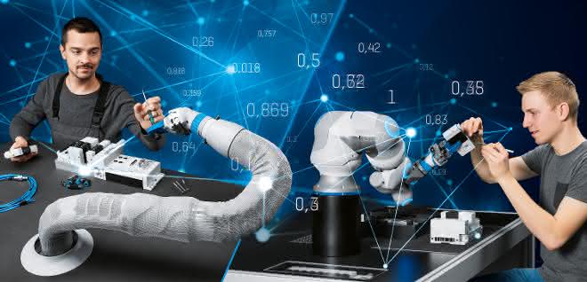 Researchers with robotic arms