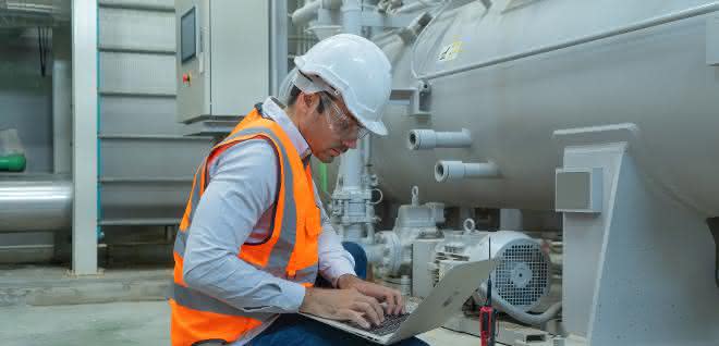 Worker at machine