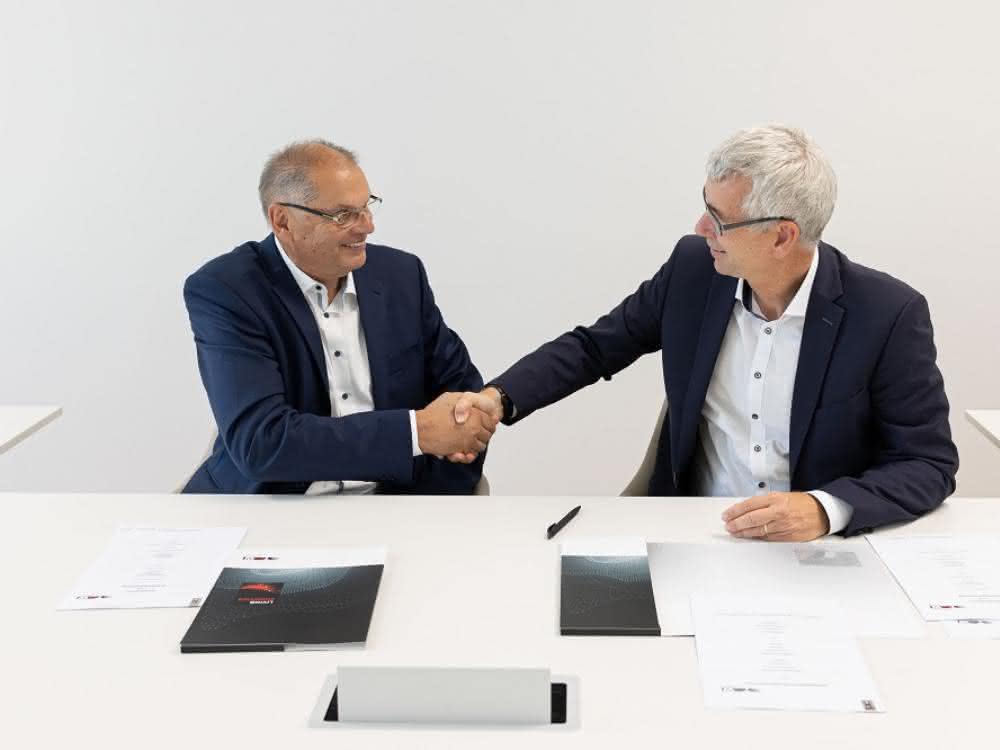 Safelog owner Michael Wolter and Harald Schröpf, CEO of the TGW Logistics Group