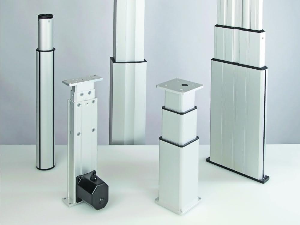 Lifting columns for electric height adjustment